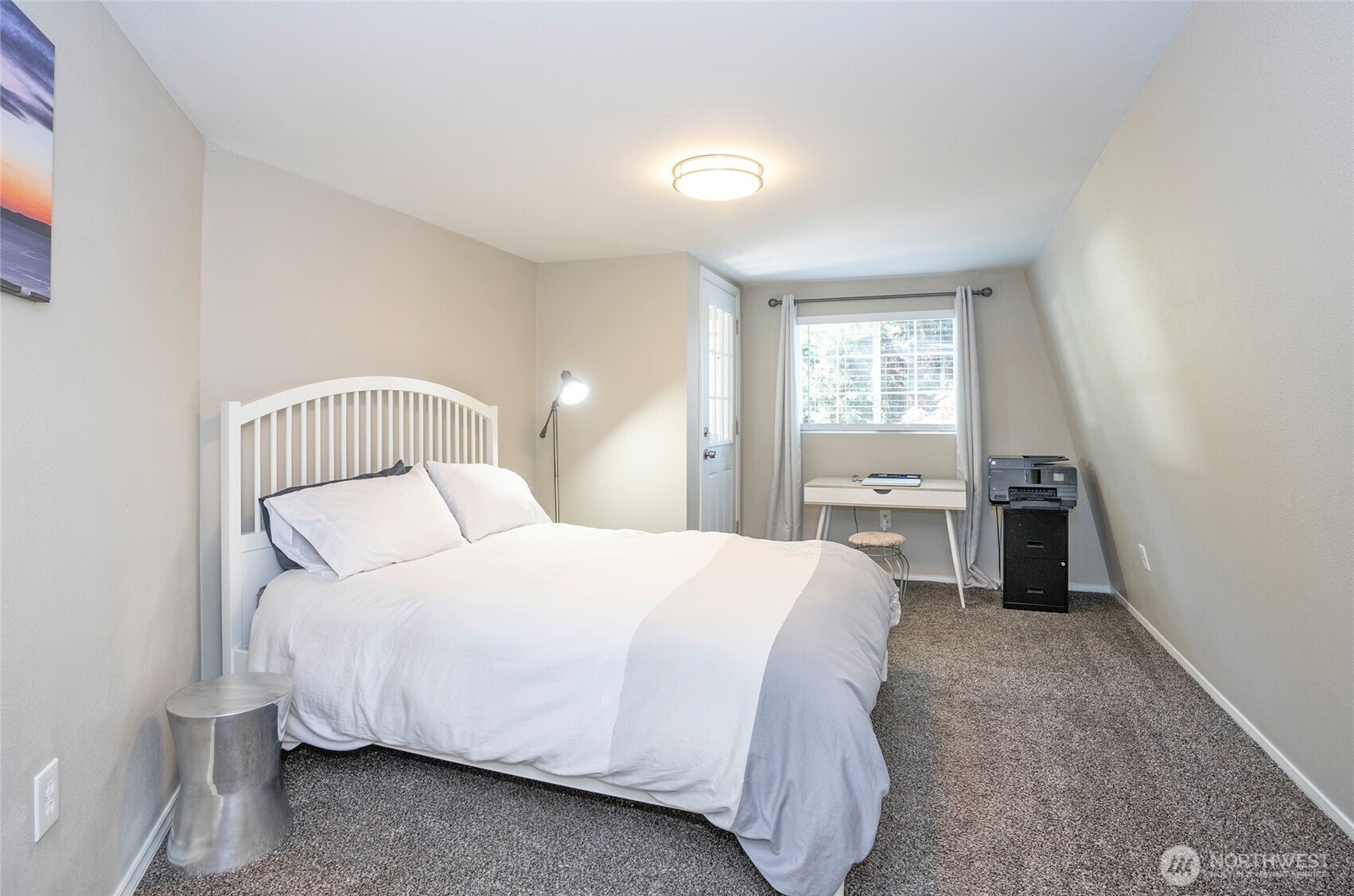 4712 Brookdale Road East Tacoma, WA 98446 - Photo 28 of 40 a bedroom with a bed and a window