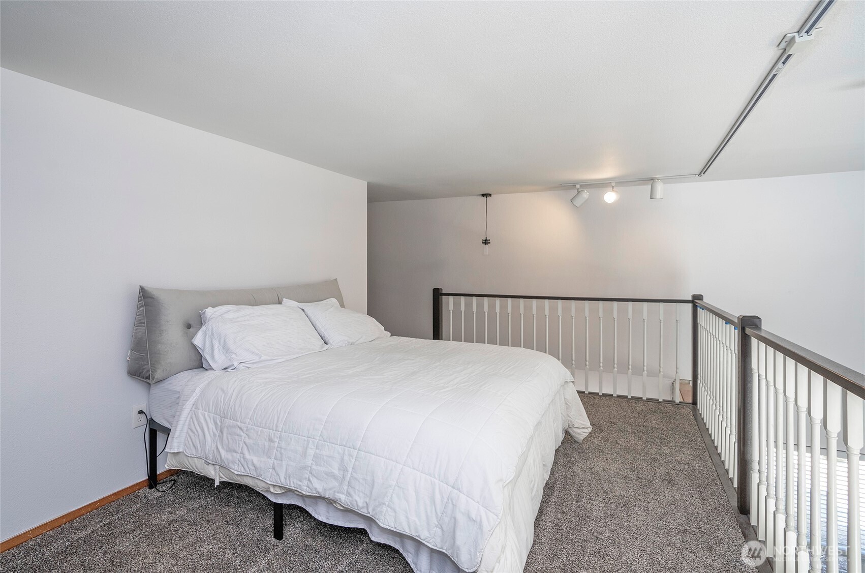 4712 Brookdale Road East Tacoma, WA 98446 - Photo 29 of 40 a bedroom with a bed and a window