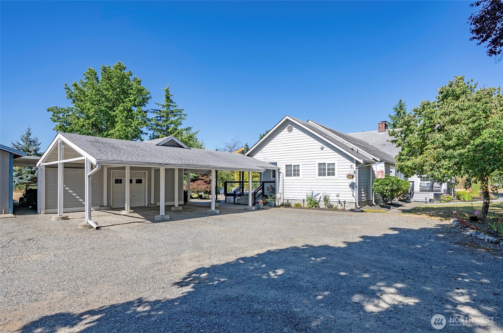 4712 Brookdale Road East Tacoma, WA 98446 - Photo 3 of 40 a view of a house with a outdoor space