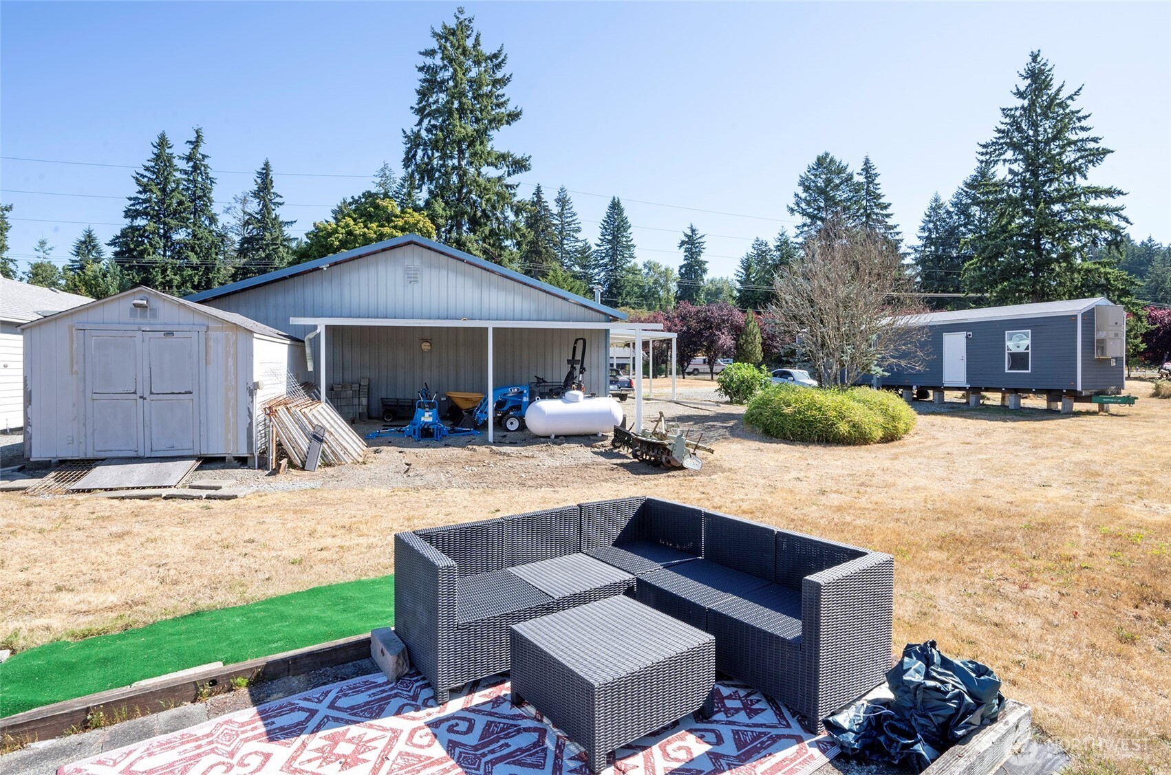 4712 Brookdale Road East Tacoma, WA 98446 - Photo 37 of 40 a view of a backyard with sitting area