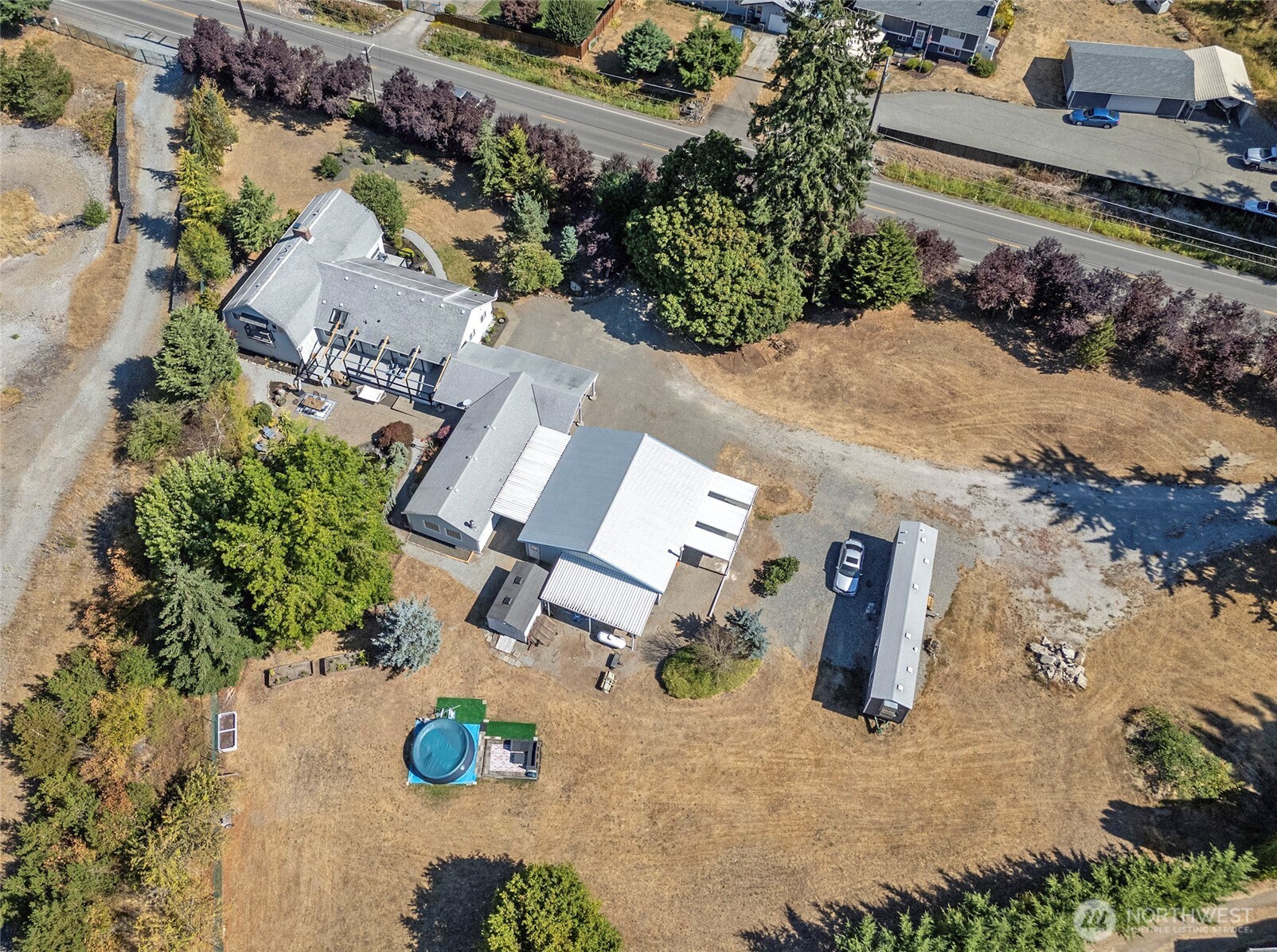 4712 Brookdale Road East Tacoma, WA 98446 - Photo 40 of 40 an aerial view of residential house with outdoor space