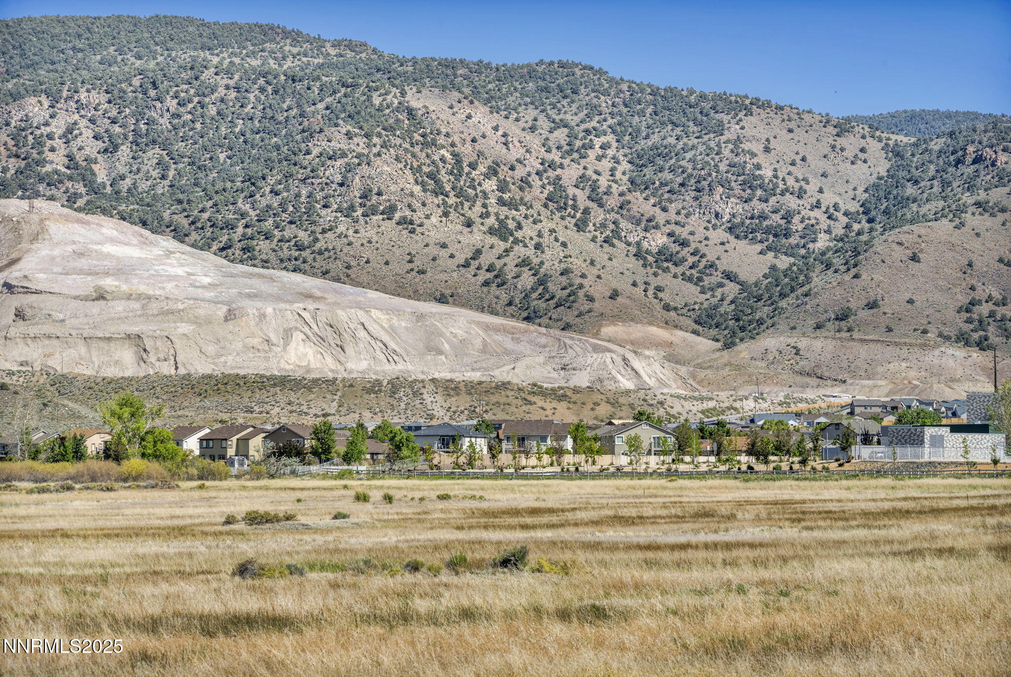1940 Dark Horse Road, Unit C Reno, NV 89521 - Photo 15 of 69 a view of a town with mountains in the background