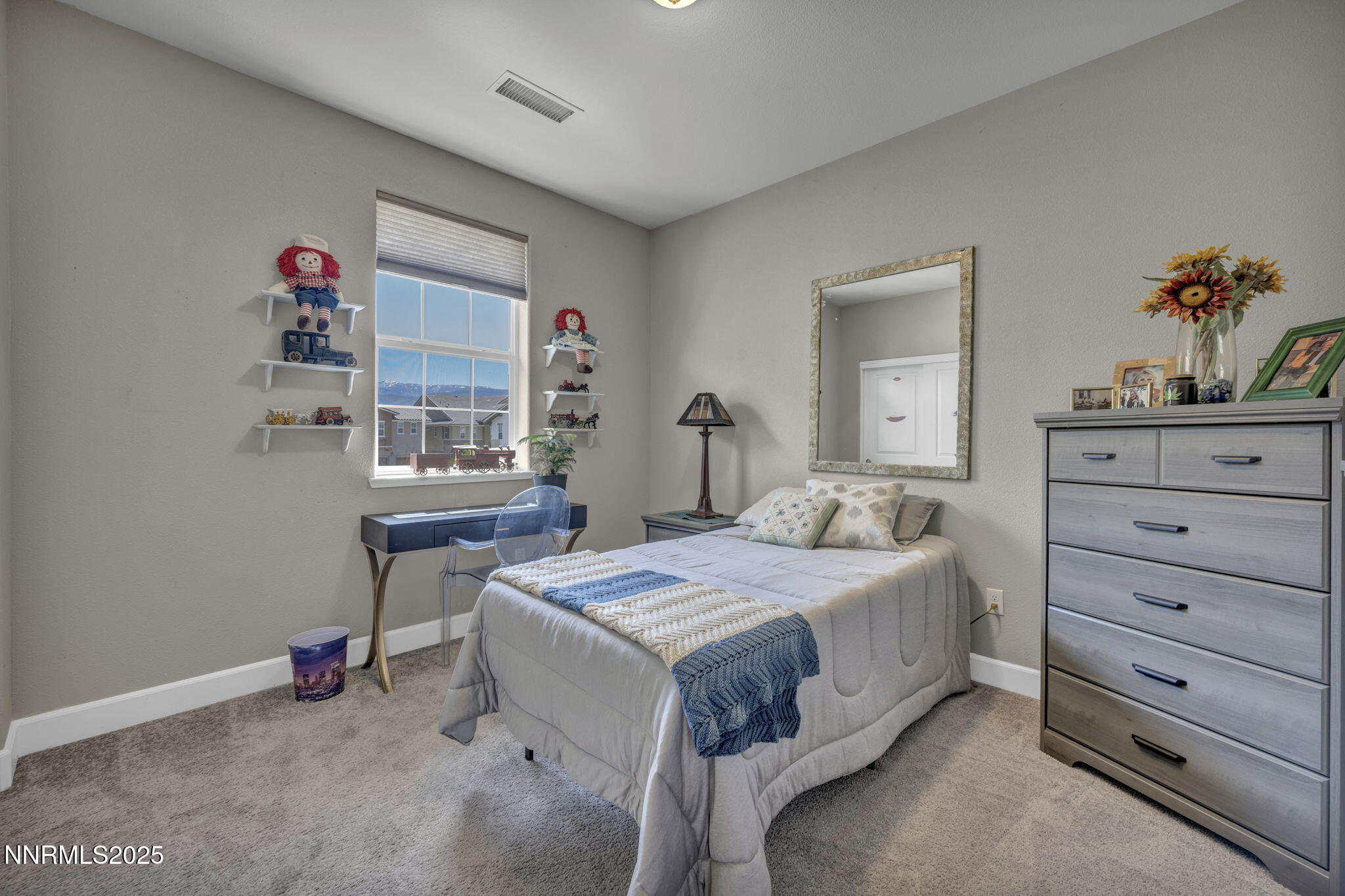 1940 Dark Horse Road, Unit C Reno, NV 89521 - Photo 36 of 69 a bedroom with a bed and a dresser