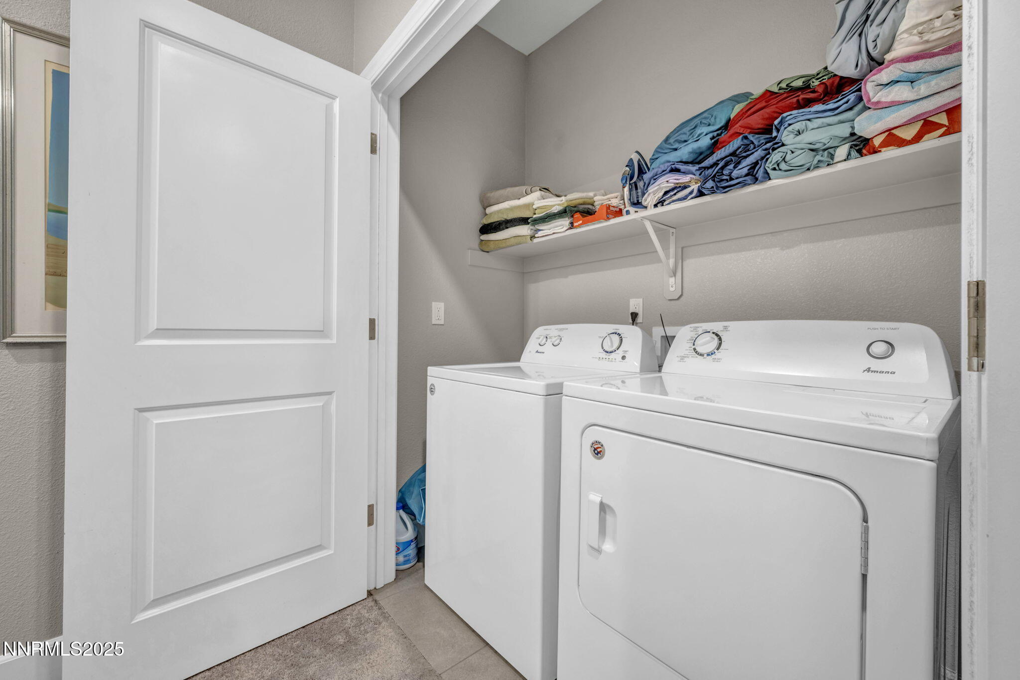 1940 Dark Horse Road, Unit C Reno, NV 89521 - Photo 41 of 69 a utility room with dryer and washer