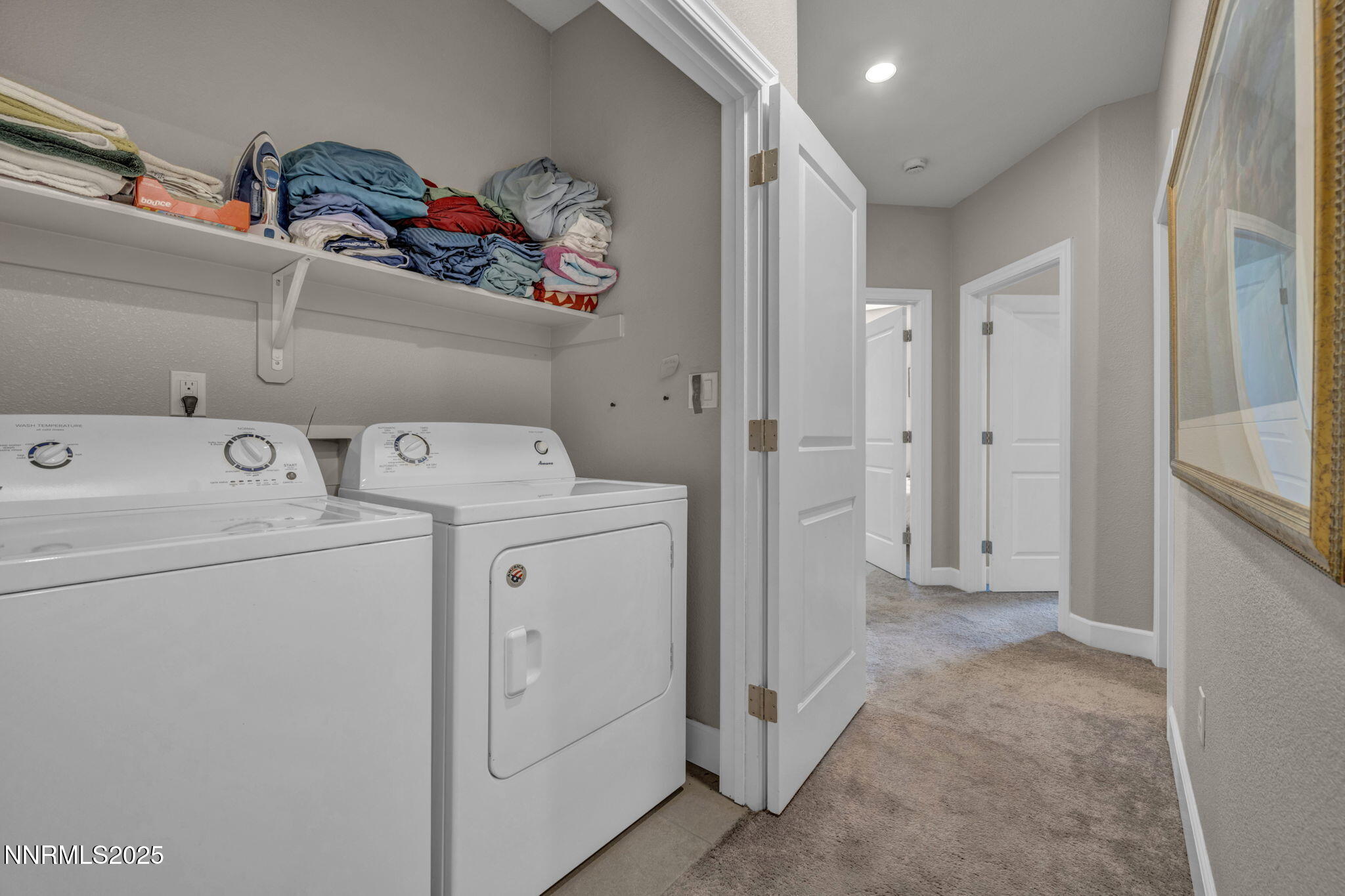 1940 Dark Horse Road, Unit C Reno, NV 89521 - Photo 42 of 69 a view of storage and utility room with washer and dryer