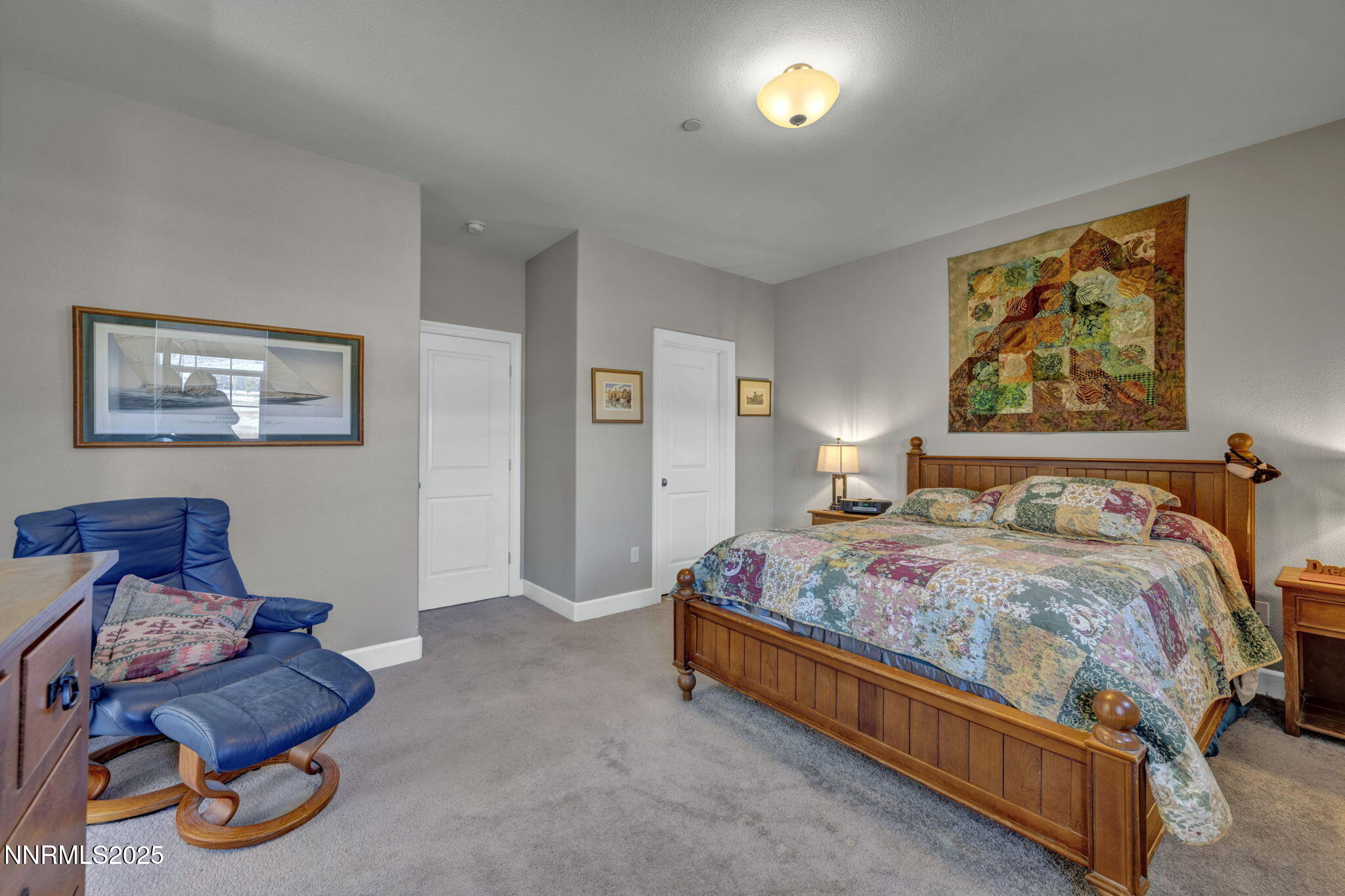1940 Dark Horse Road, Unit C Reno, NV 89521 - Photo 46 of 69 a bedroom with a bed and dresser