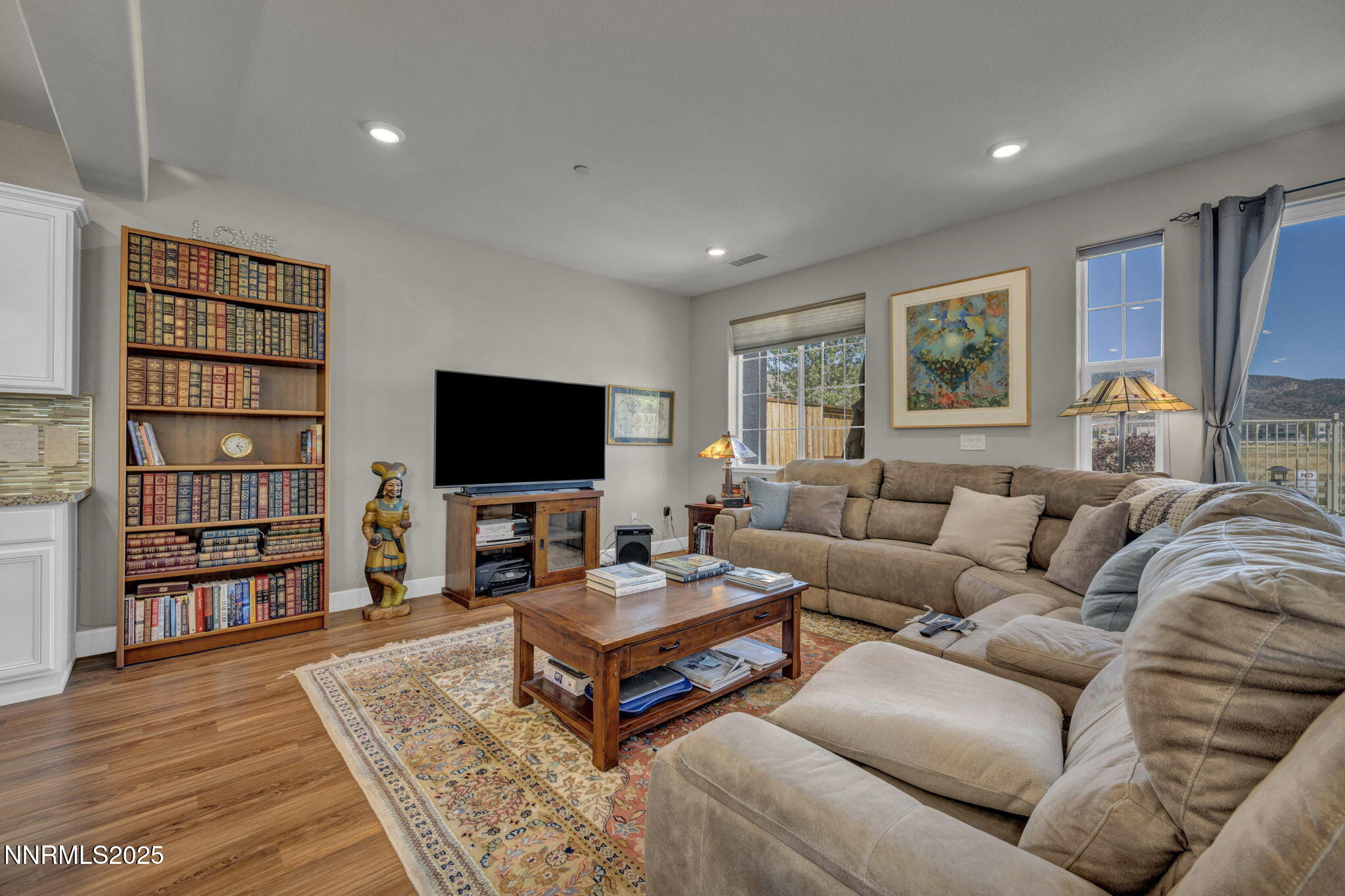 1940 Dark Horse Road, Unit C Reno, NV 89521 - Photo 50 of 69 a living room with furniture and a flat screen tv