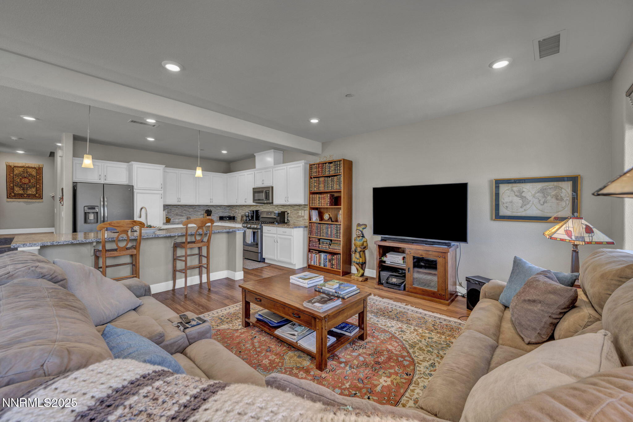 1940 Dark Horse Road, Unit C Reno, NV 89521 - Photo 52 of 69 a living room with furniture and a flat screen tv