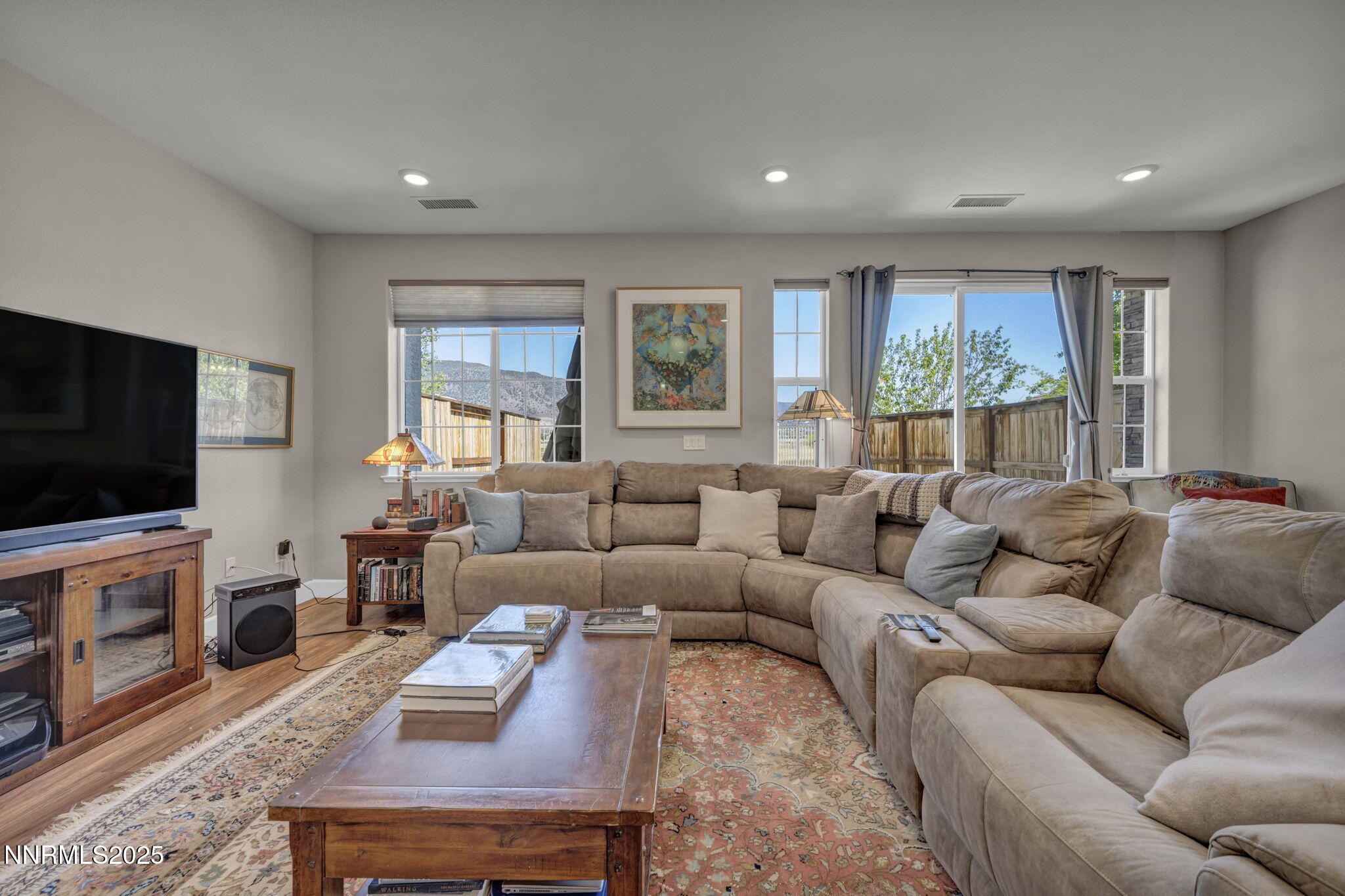 1940 Dark Horse Road, Unit C Reno, NV 89521 - Photo 55 of 69 a living room with furniture and a flat screen tv