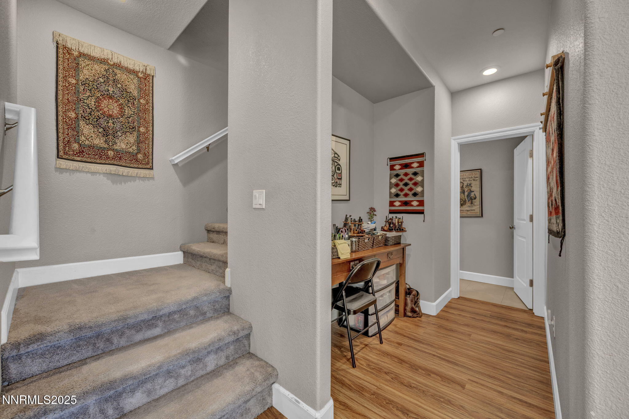 1940 Dark Horse Road, Unit C Reno, NV 89521 - Photo 65 of 69 a view of a hallway with wooden floor and closet
