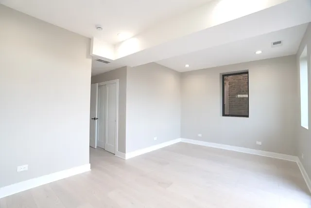 a bathroom with a sink toilet and mirror