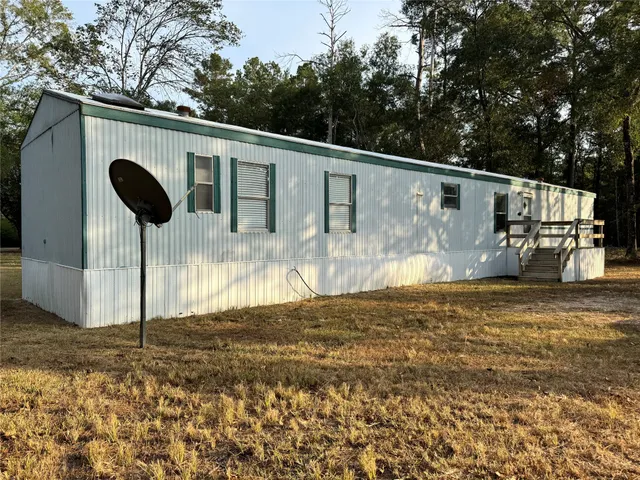 a view of a front of house with large space