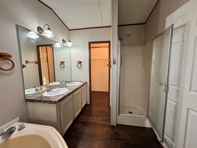 a bathroom with sink and mirror