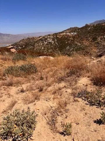 a view of mountains and valleys