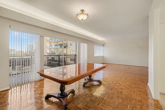 a view of a swimming pool with a terrace