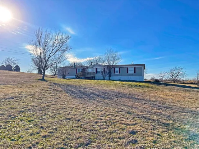 a view of swimming pool with an outdoor space and seating area