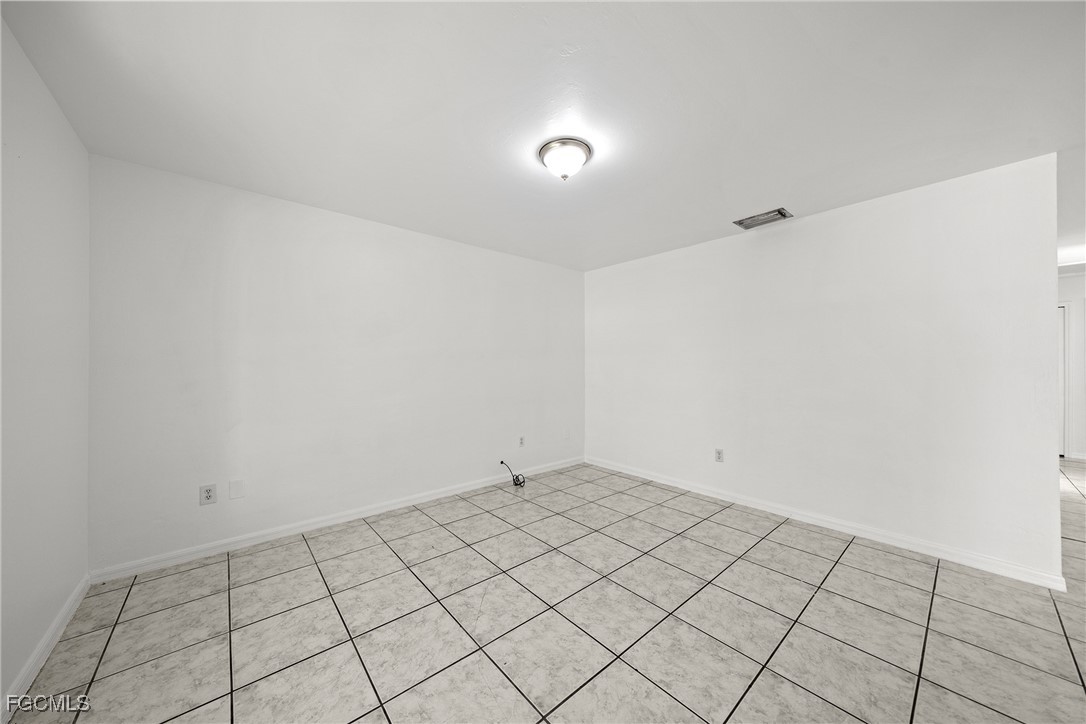 4735 30th Street Southwest Lehigh Acres, FL 33973 - Photo 18 of 43 a view of an empty room