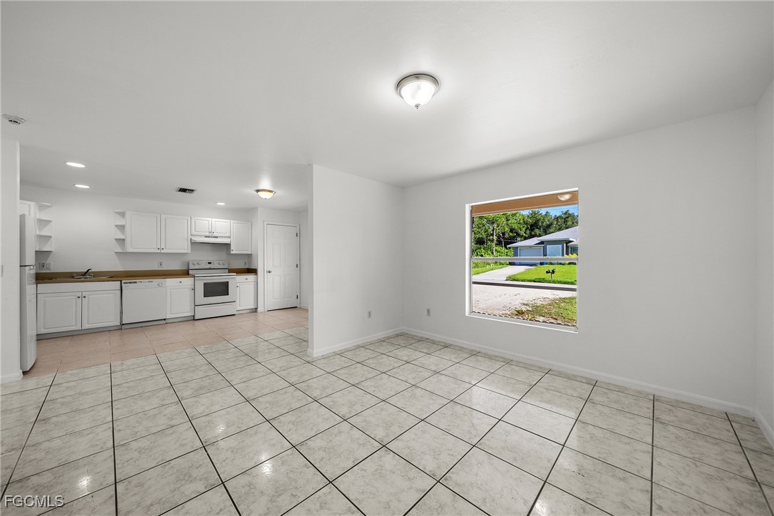 4735 30th Street Southwest Lehigh Acres, FL 33973 - Photo 23 of 43 a view of an empty room and window