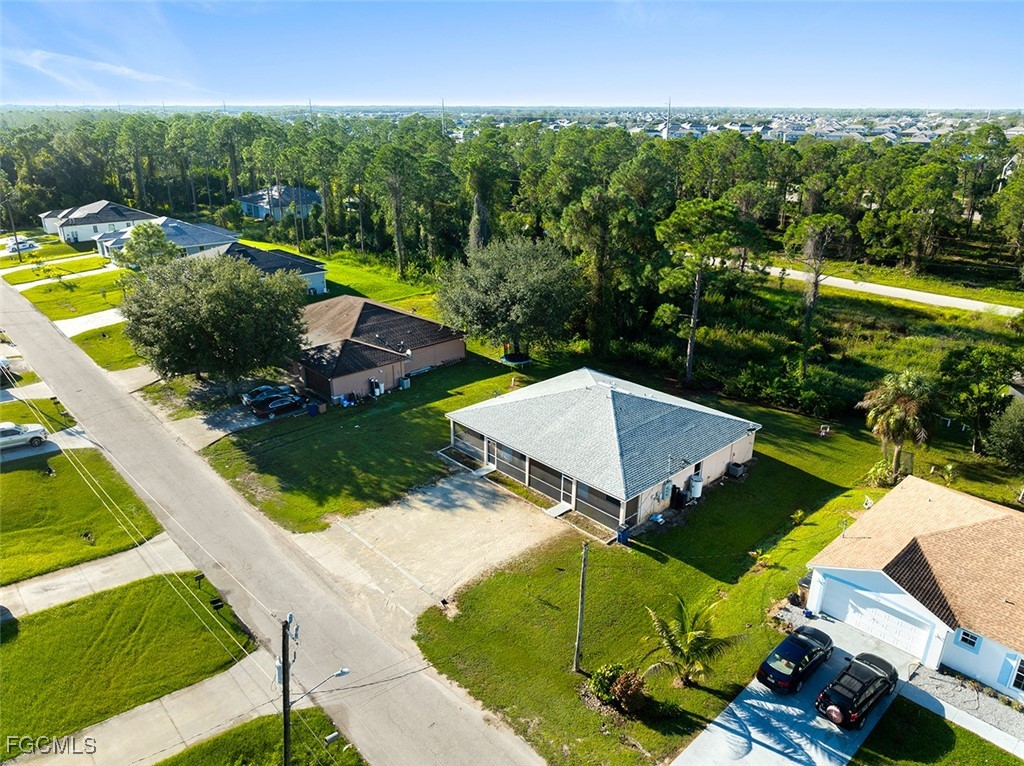 4735 30th Street Southwest Lehigh Acres, FL 33973 - Photo 36 of 43 an aerial view of a house
