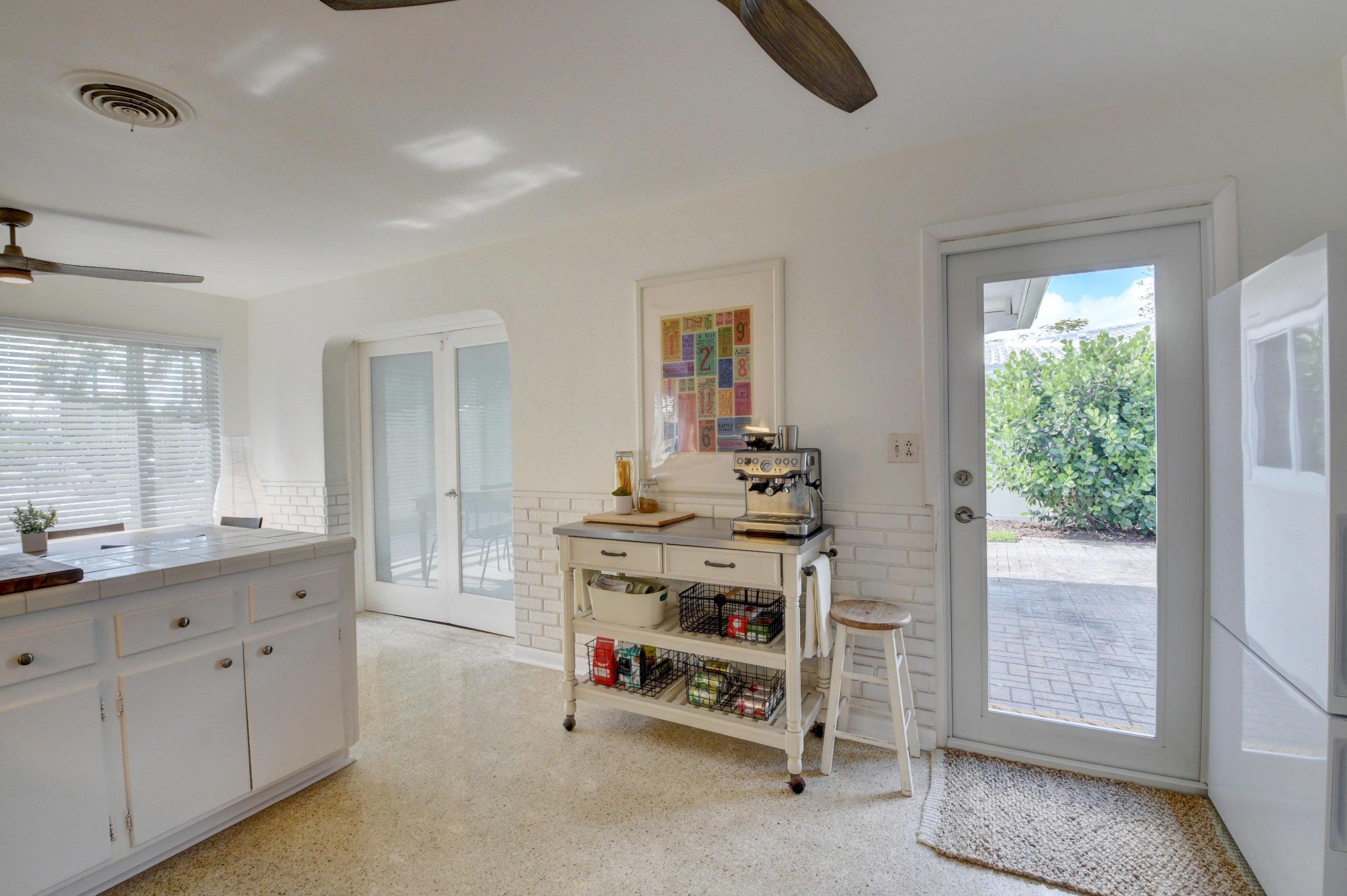 601 Northwest 14th Avenue Boca Raton, FL 33486 - Photo 15 of 38 Kitchen leads to patio