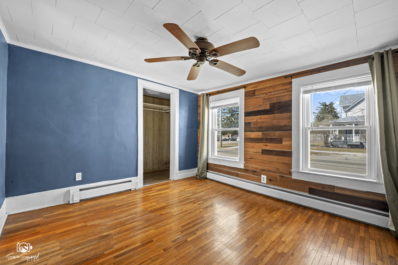10947 1st Street Mokena, IL 60448 - Photo 21 of 29 a view of a livingroom with a ceiling fan and window