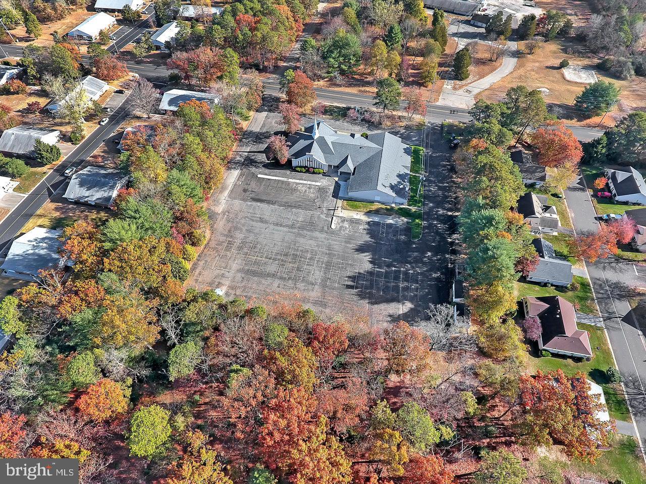 40 Schoolhouse Road Manchester Township, NJ 08759 - Photo 2 of 5 a view of a city with flower plants