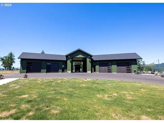 a house view with a garden space