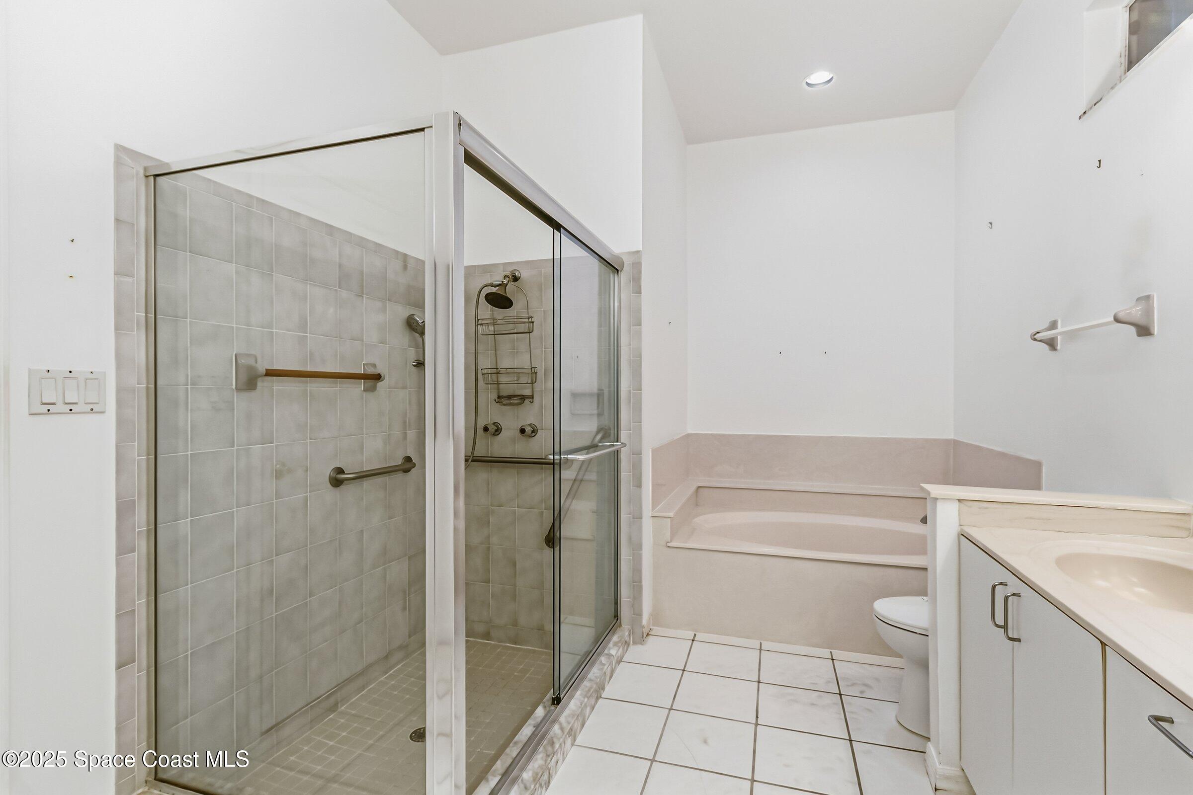 4048 Sand Ridge Drive Merritt Island, FL 32953 - Photo 24 of 70 a bathroom with a shower and a sink
