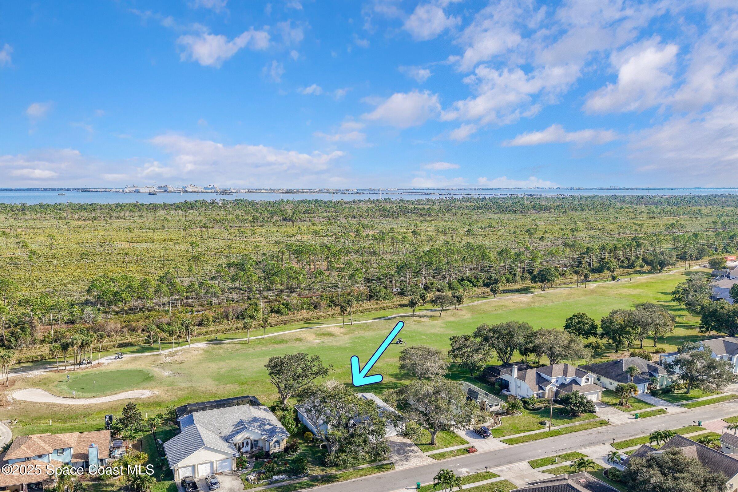 4048 Sand Ridge Drive Merritt Island, FL 32953 - Photo 64 of 70 a view of a city with an ocean beach