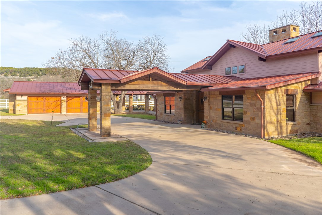 2407 River Hills Road Austin, TX 78733 - Photo 1 of 1 Main house with sweeping, circular drive and covered entrance.