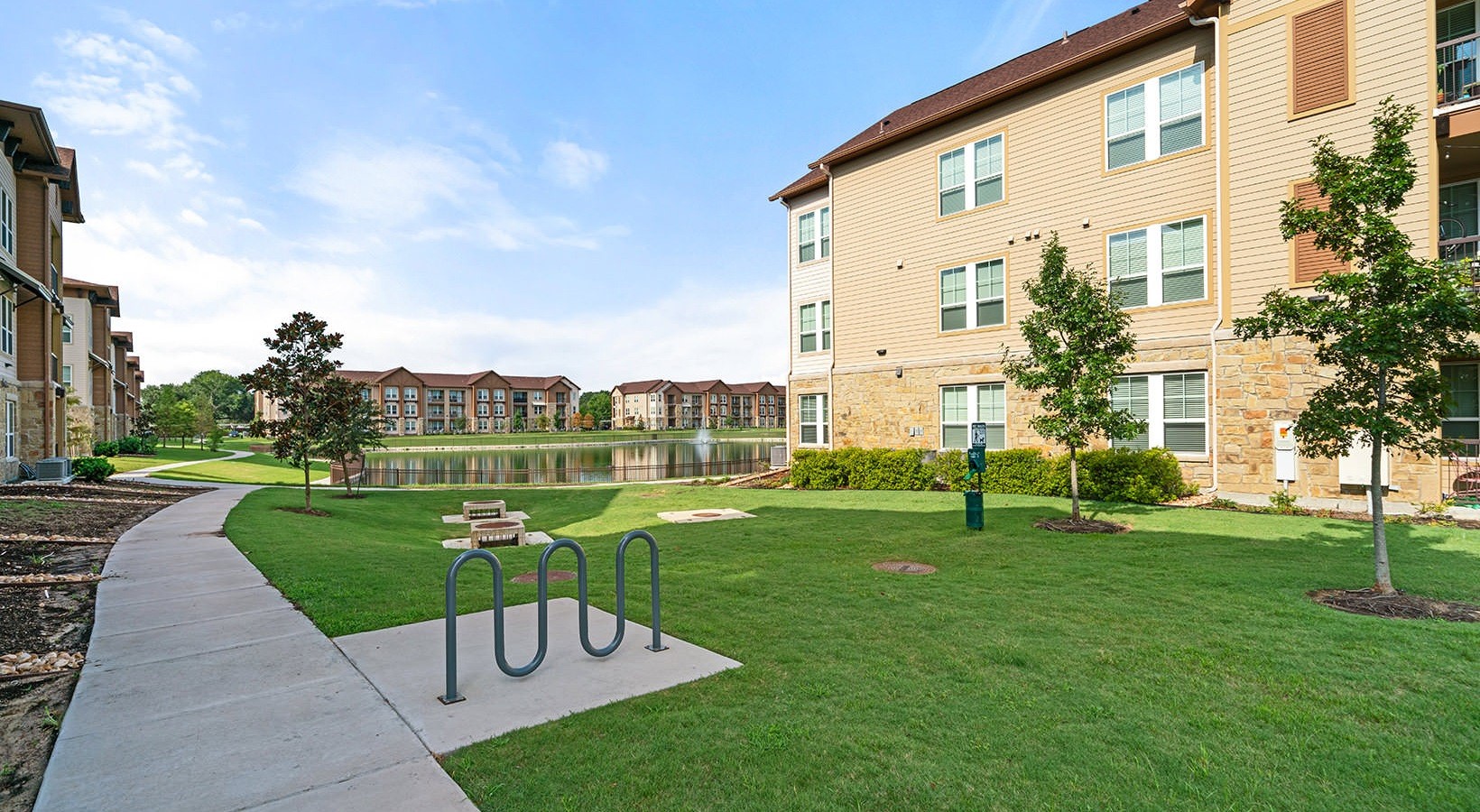 1700 Katy Fort Bend Road, Unit 1105 Katy, TX 77493 - Photo 22 of 30 a view of a city with tall buildings and a big yard