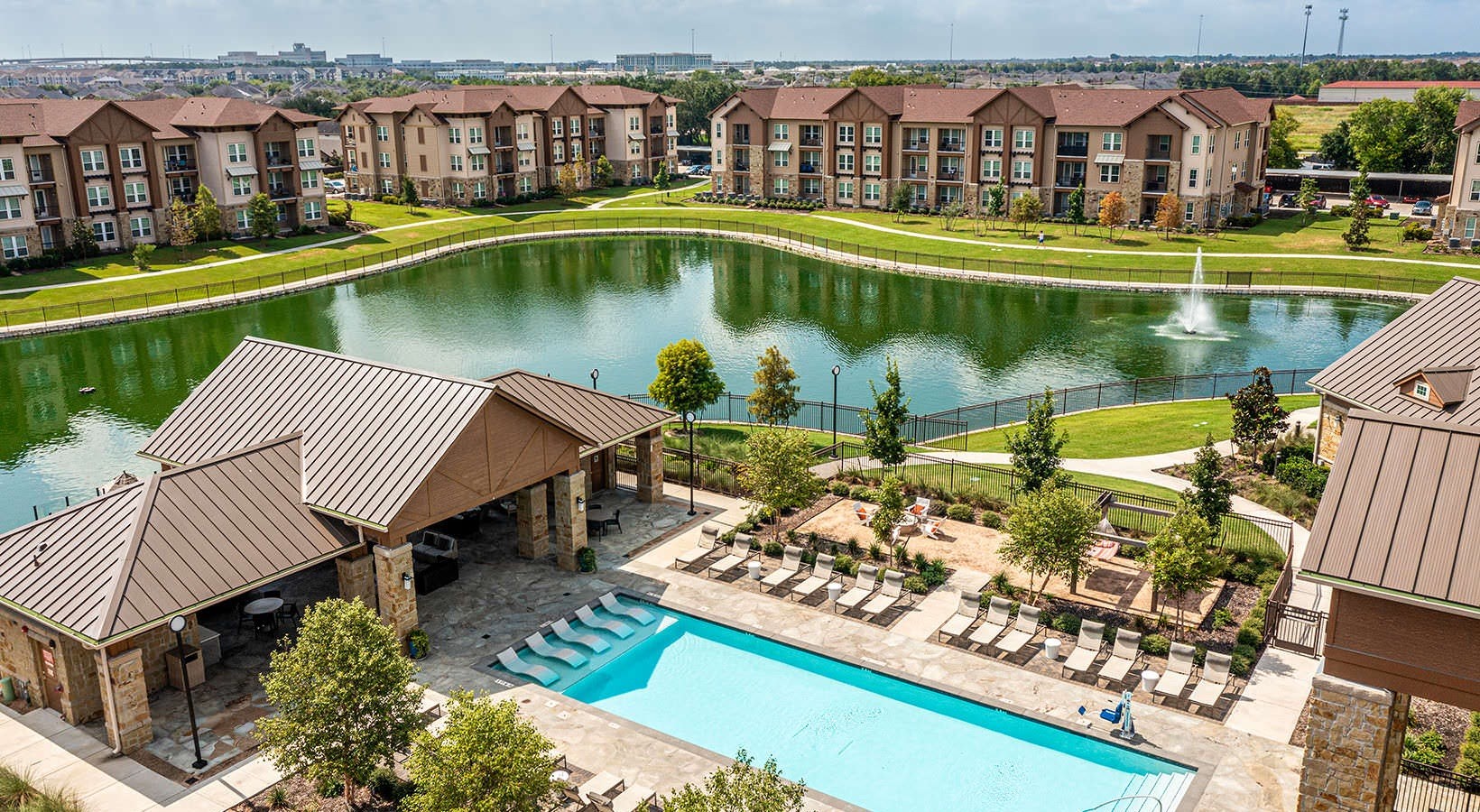1700 Katy Fort Bend Road, Unit 1105 Katy, TX 77493 - Photo 6 of 30 an aerial view of a house with a swimming pool