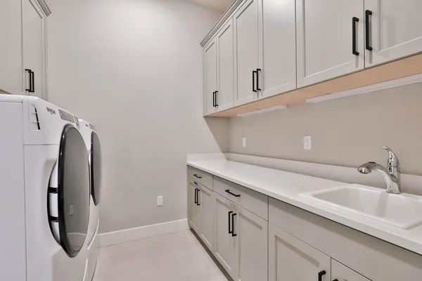 a bathroom with a sink and mirror
