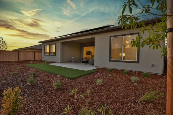 a view of a house with a patio