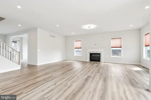 a bathroom with a sink a mirror and shower