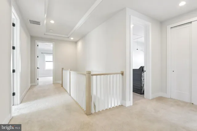 a view of livingroom with hardwood floor and a ceiling fan
