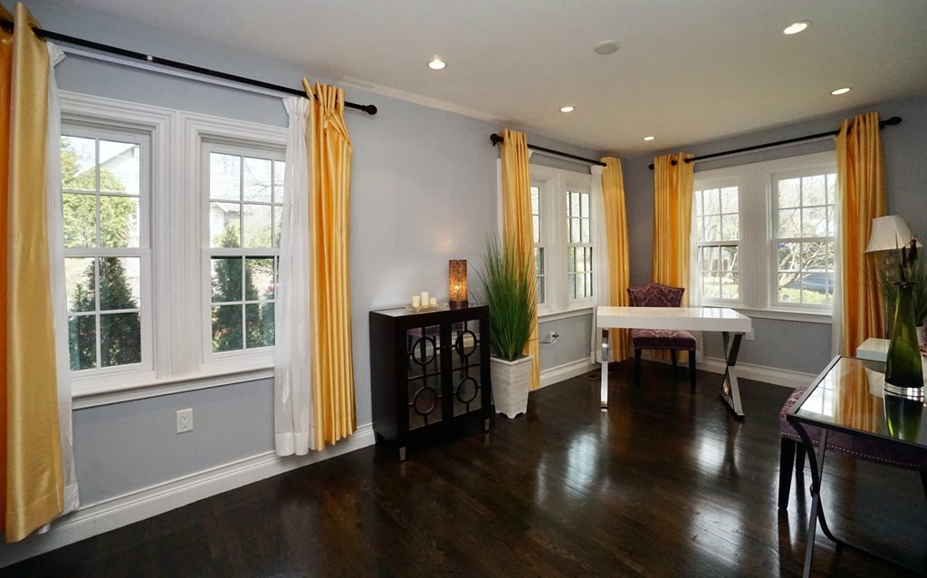 725 Chestnut Street Newton, MA 02468 - Photo 11 of 42 a living room with furniture and a large window