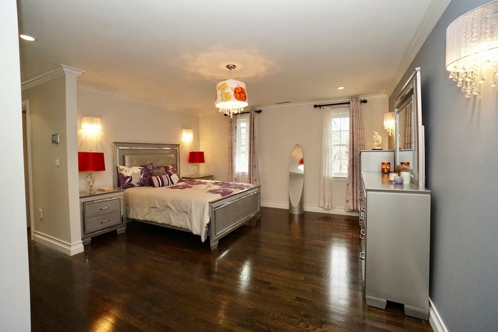 725 Chestnut Street Newton, MA 02468 - Photo 14 of 42 a bed room with a bed mirror and a window