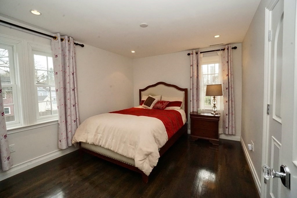 725 Chestnut Street Newton, MA 02468 - Photo 23 of 42 a bedroom with a bed and a window