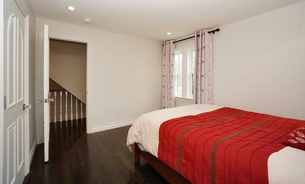 725 Chestnut Street Newton, MA 02468 - Photo 24 of 42 a bedroom with a bed and a window