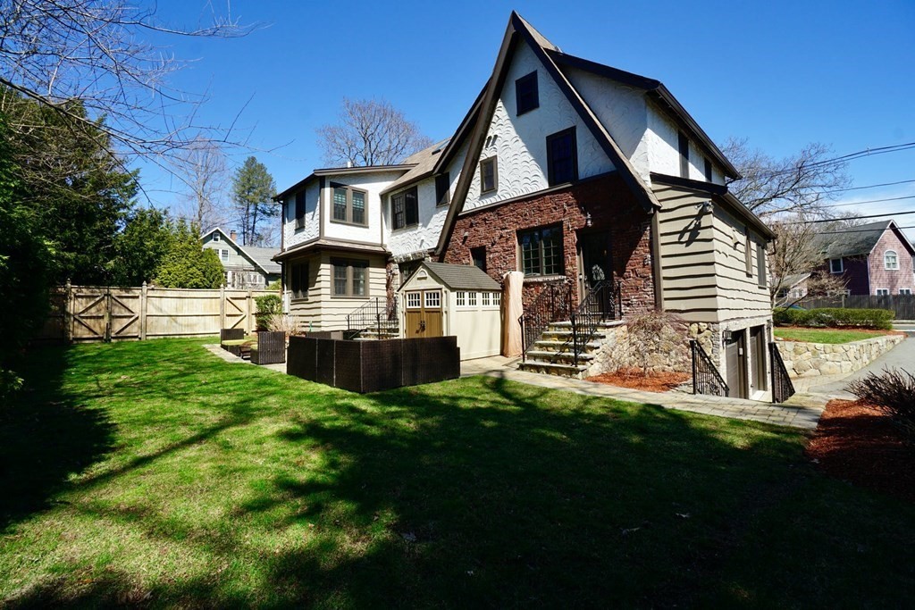 725 Chestnut Street Newton, MA 02468 - Photo 39 of 42 a front view of a house with a yard
