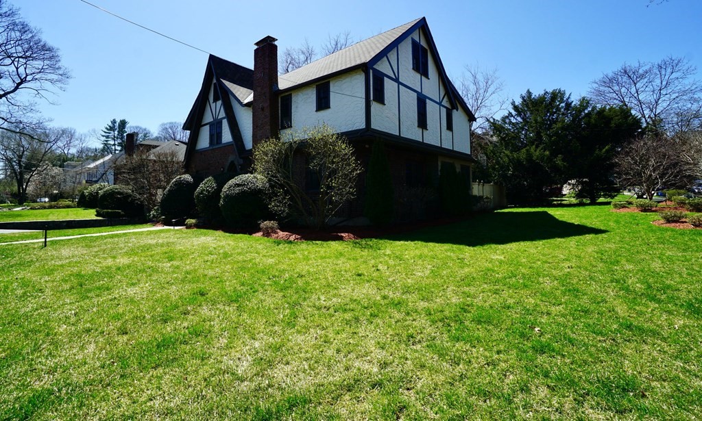 725 Chestnut Street Newton, MA 02468 - Photo 42 of 42 a front view of a house with garden