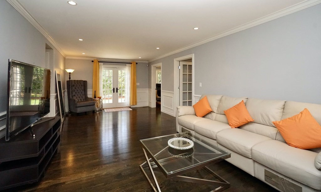725 Chestnut Street Newton, MA 02468 - Photo 8 of 42 a living room with furniture and a flat screen tv