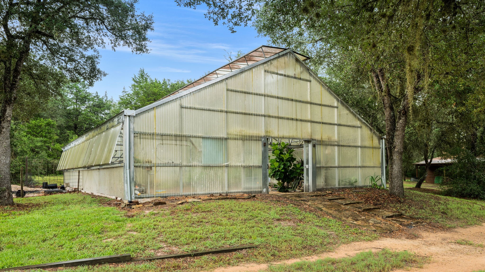 1114 Star Ridge Road Weimar, TX 78962 - Photo 9 of 50 a house view with a outdoor space