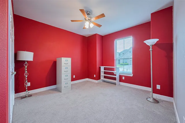 a bathroom with a bathtub and toilet