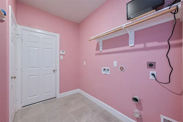 a bathroom with a bathtub shower sink vanity mirror and toilet