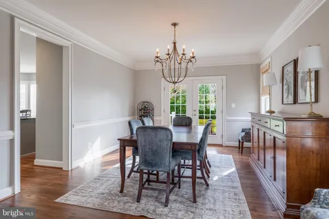 a spacious bedroom with a bed and a couch