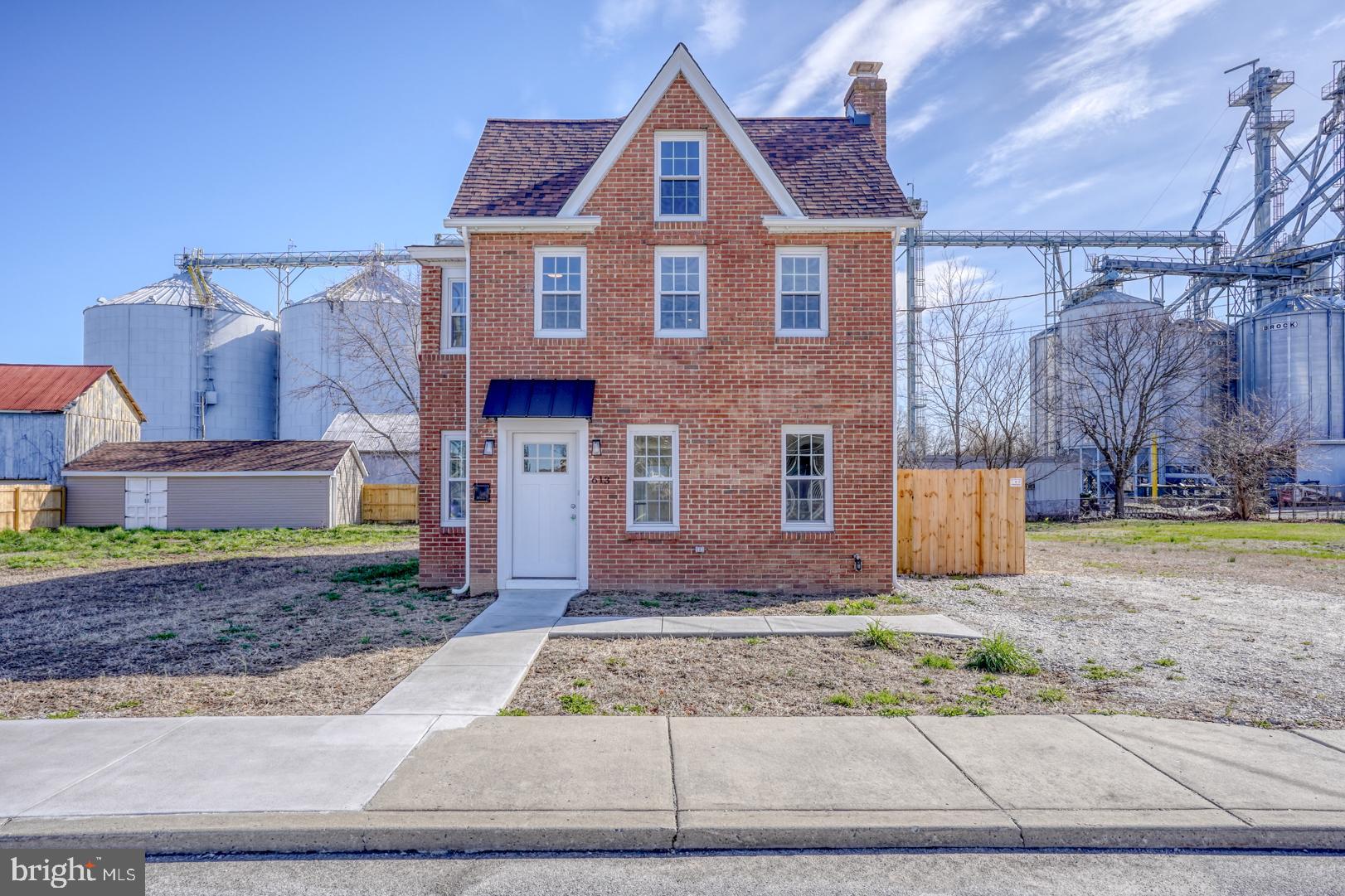613 Taylor Street Townsend, DE 19734 - Photo 36 of 36 a front view of a house with garden