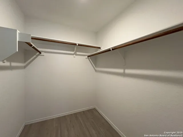 a view of a room with racks on the wall