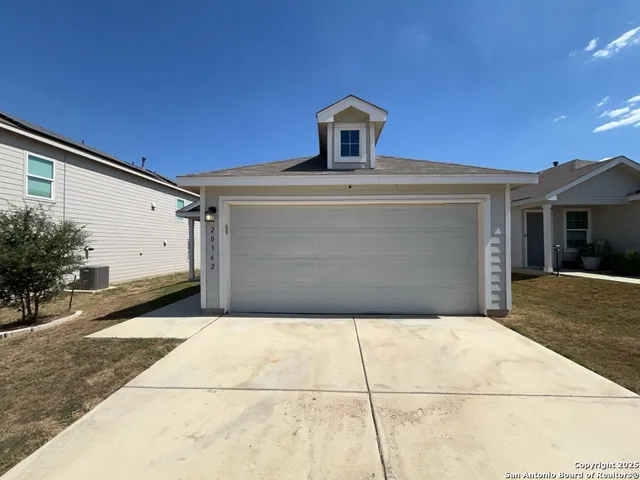 a picture of a room with a floor to a sink